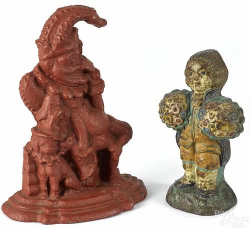Two painted cast iron doorstops, late 19th c., 11