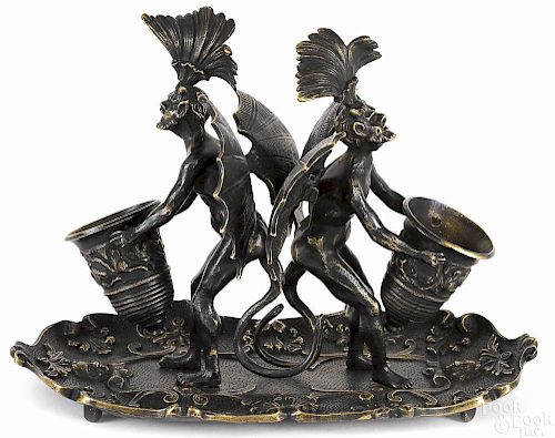 Gothic figural bronze match holder and tray depic
