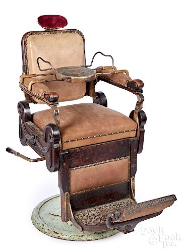 Louis Hanson carved oak barber chair