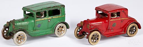 Two Arcade cast iron Ford cars