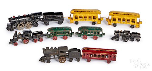 Group of small cast iron floor trains
