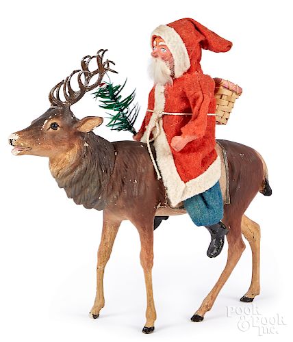 German Santa Claus on reindeer candy container