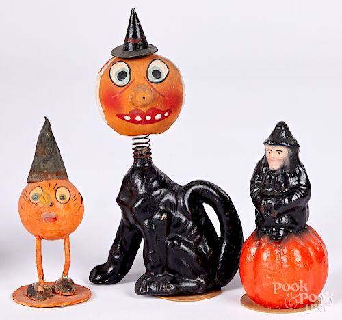 Three Halloween candy containers