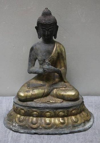 A Gilded Bronze Figure of the Buddha
