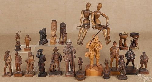 Twenty Continental carved wooden figures, 19th/20