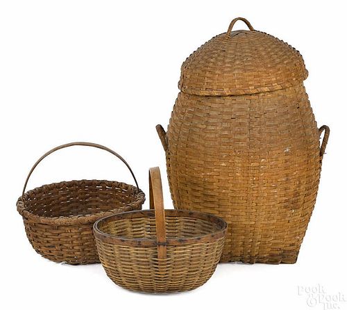 Three splint baskets, to include a feather basket