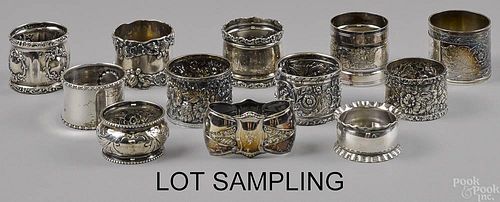 Thirty-five silver and silver plate napkin rings.