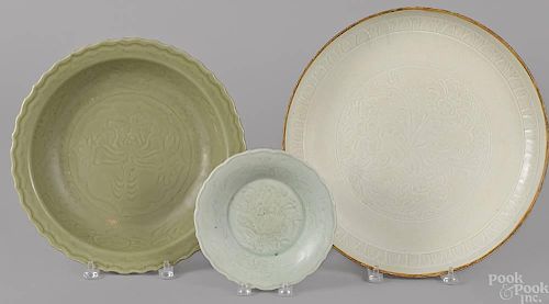 Chinese incised celadon charger, together with tw
