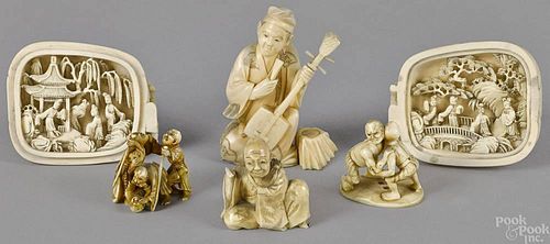 Three carved netsukes, 19th c., together with a g