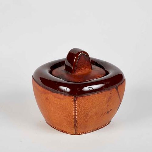 LEATHER AND POTTERY JAR