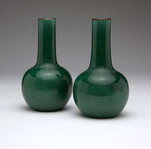 A pair of Chinese apple green crackle-glazed vases