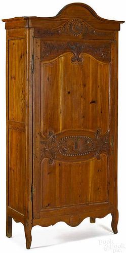 French pine wardrobe, 19th c., with carved doors