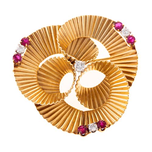 A Ladies Fluted Spiral Pin with Rubies & Diamonds