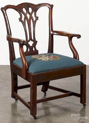 Chippendale walnut necessary chair, late 18th c., with a carved crest and pierced splat.