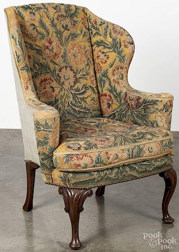 George II style mahogany wingback chair with floral needlework upholstery.