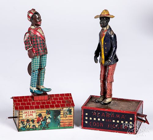 Two tin lithograph black Americana wind-up toys