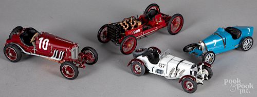Four scale model cars