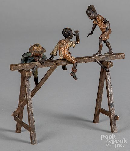 Black Americana bronze of three children playing