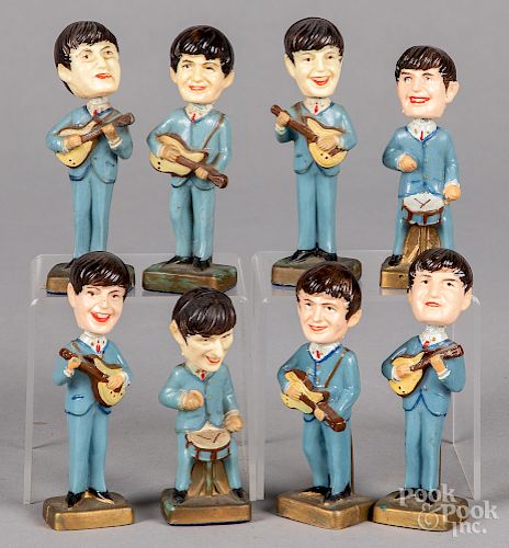 Two sets of four vintage plastic Beatles nodders