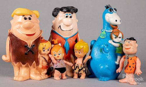 Three hard plastic Flintstone bank figures, etc.