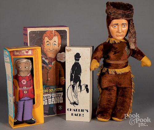 Four character dolls