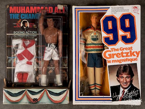 Two sports action figures in original boxes