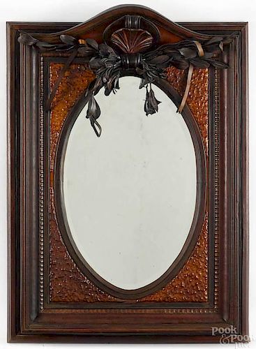 Contemporary leather encased mirror with a shell