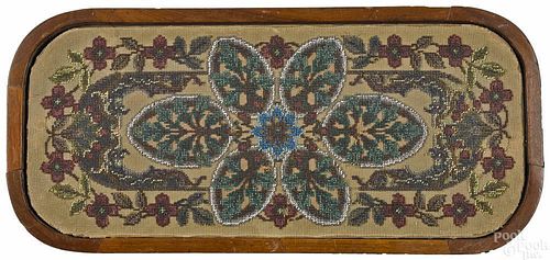 Victorian beaded trivet with a mahogany frame, 19