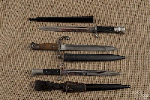 Three German World War II daggers.