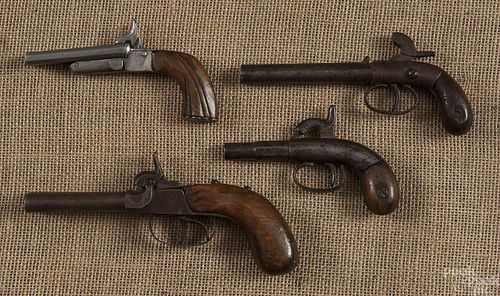 Three percussion pistols, two - .32 caliber and a