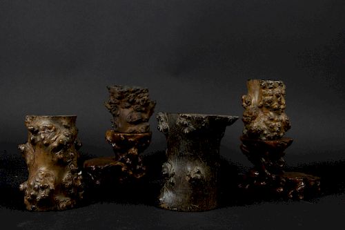 A Group of Burl Brush Pots and Stands.