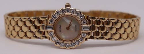 JEWELRY. Ladies Geneve 14kt Gold and Diamond Watch