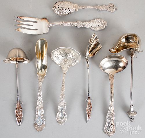 Eight sterling silver serving utensils