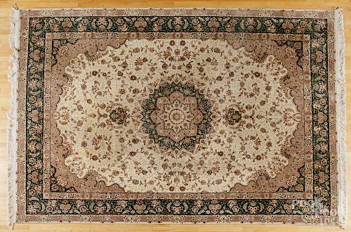Roomsize Tabriz style carpet