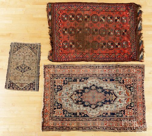 Three oriental carpets