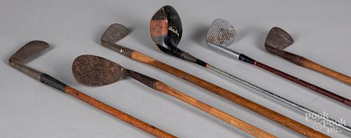 Six early golf clubs