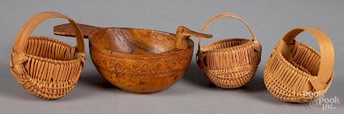 Three miniature baskets and a carved bird bowl