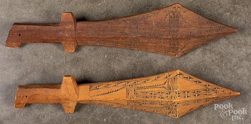 Two South Pacific carved clubs