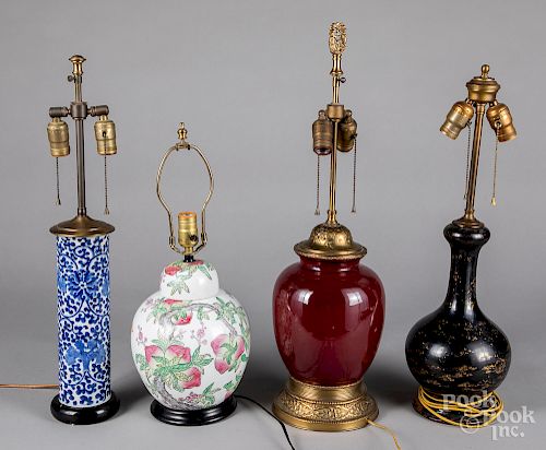 Five Chinese and Japanese porcelain table lamps.