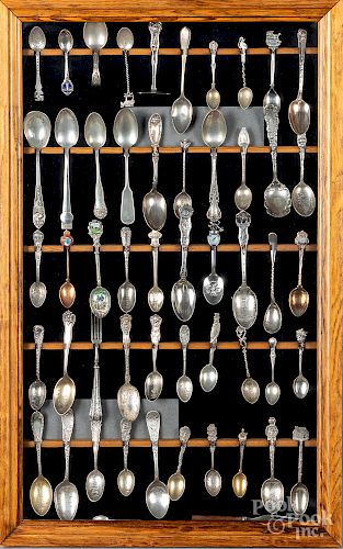 Framed group of sterling silver and plated spoons