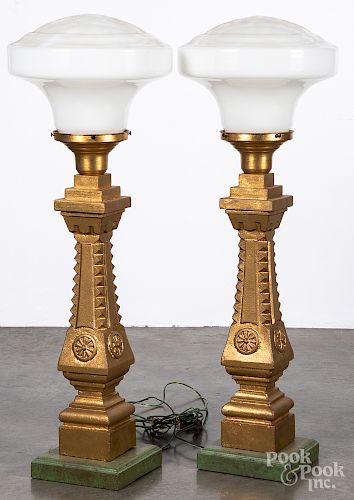 Pair of carved giltwood table lamps