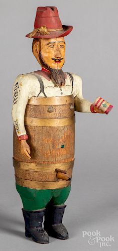 Carved and painted barrel man figure