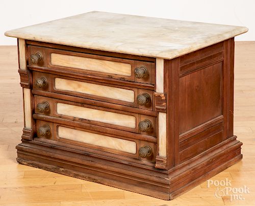 Marble top spool cabinet