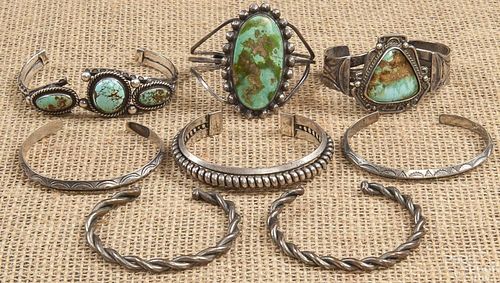 Eight silver and turquoise Native American bracel