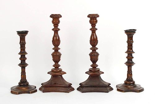 Four Carved Wood Candlesticks, 20th C.