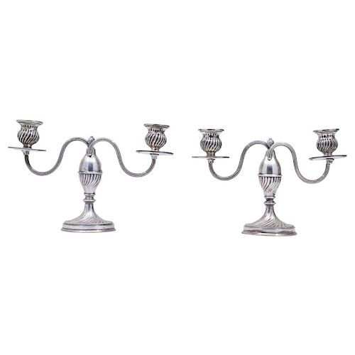 PAIR OF CANDLESTICKS. GERMANY, 20TH CENTURY. G.O.B. Silver, 800. Both with molded stem with pearly motifs. Can hold two candles.