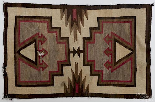 Navajo rug, ca. 1940, with geometric designs on a