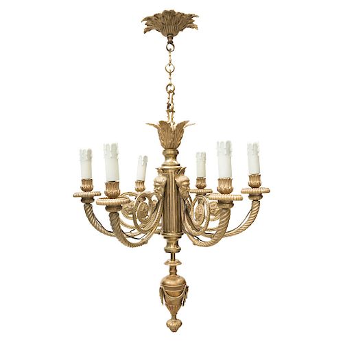 CHANDELIER. FRANCE, 20TH CENTURY. Gold-colored bronze decorated with acanto and grape leaves, vines, and Bacchus faces.