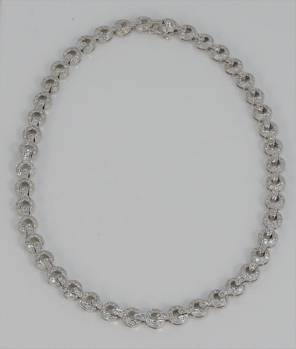 18 Karat White Gold Necklace, with forty- four sections, each set with nine diamonds. length 19 1/2 inches, 60.9 grams.