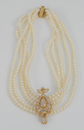 Cultured Pearl and Diamond Necklace, having five strands of cultured pearls set with a detachable old mine cut diamond, brooch set with teardrop and r
